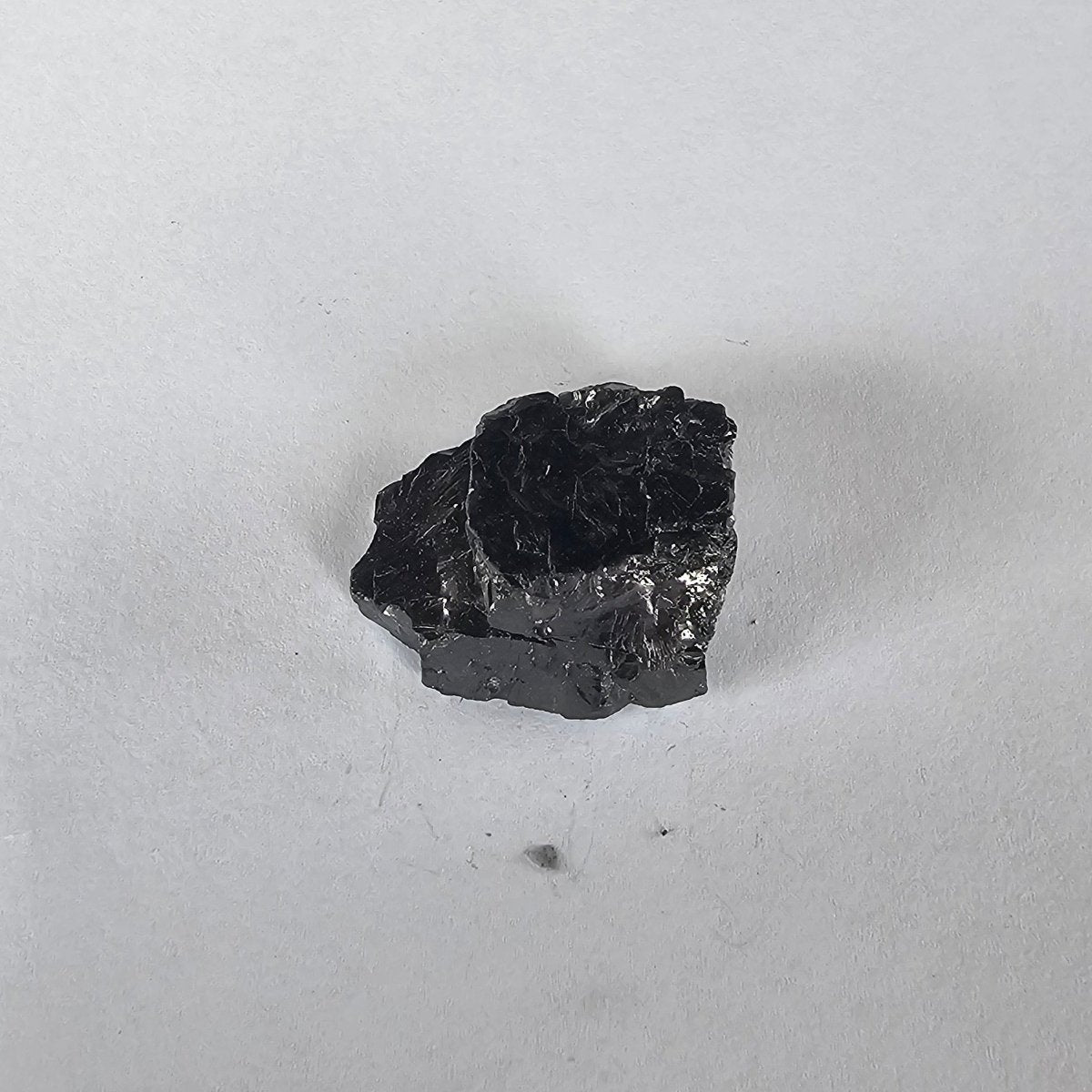 Shungite Crystal: Rare One - Piece Nugget - Abi Gamin (India) - GroundedKiwi.nz air travelcarchunk