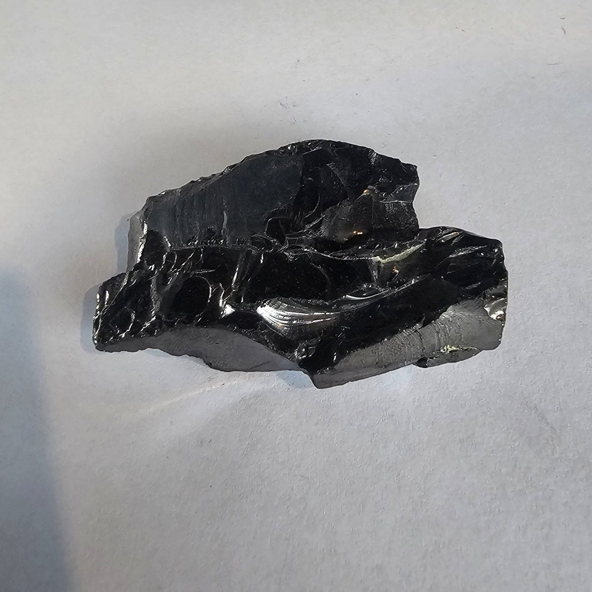 Shungite Crystal: Rare One - Piece Nugget - K2 - GroundedKiwi.nz air travelcarchunk