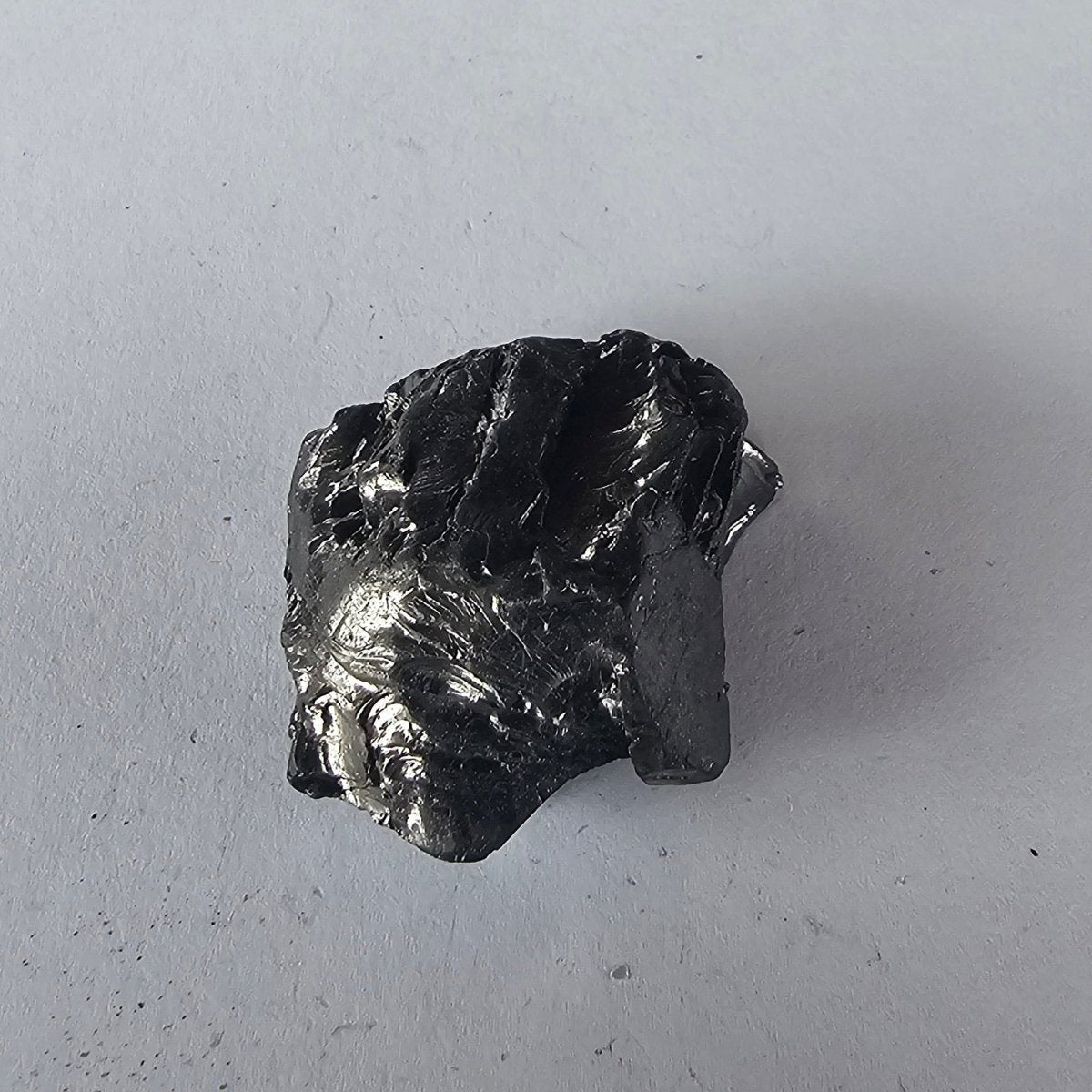Shungite Crystal: Rare One - Piece Nugget - La Perouse (NZ) - GroundedKiwi.nz air travelcarchunk