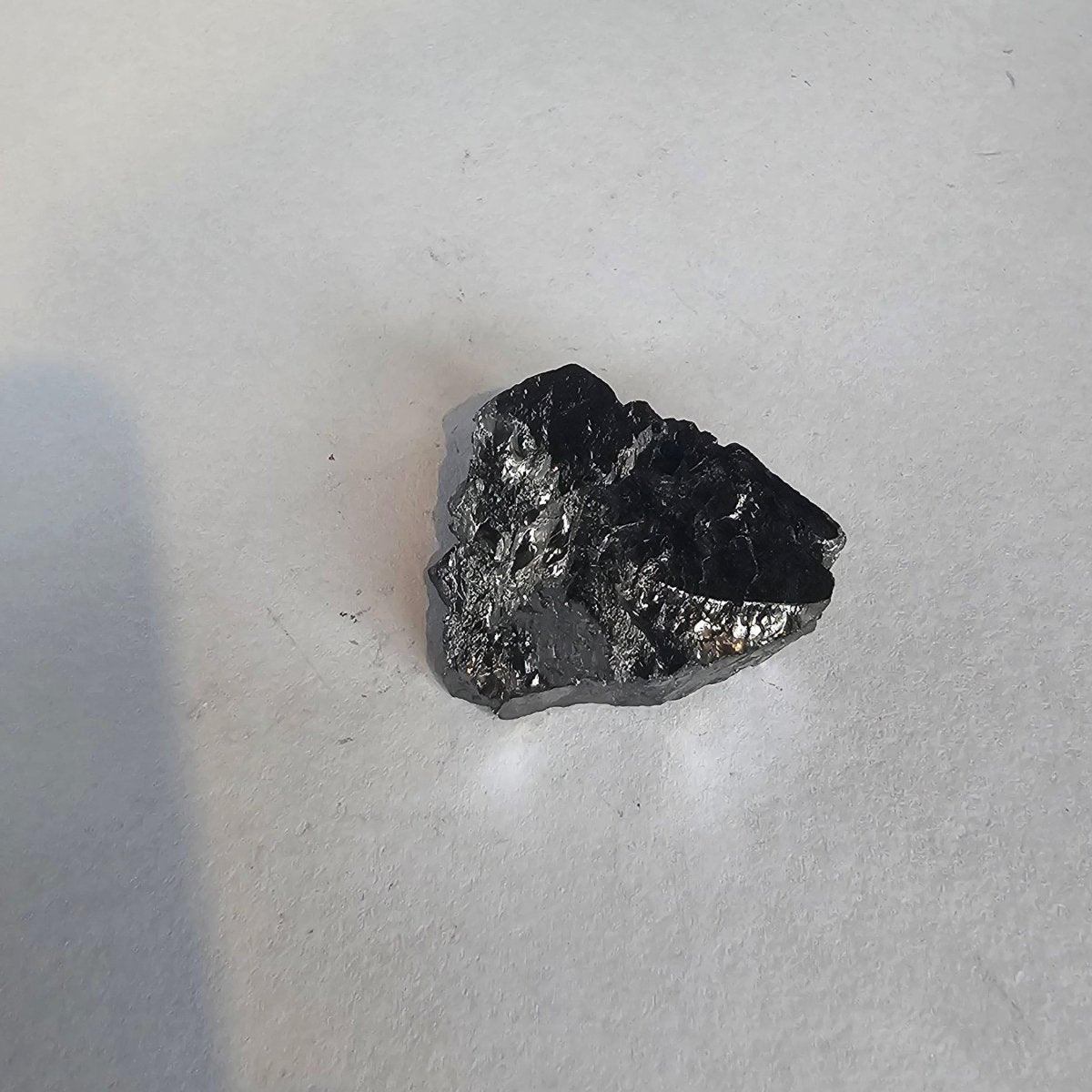 Shungite Crystal: Rare One - Piece Nugget - Mount McKinley - GroundedKiwi.nz air travelcarchunk