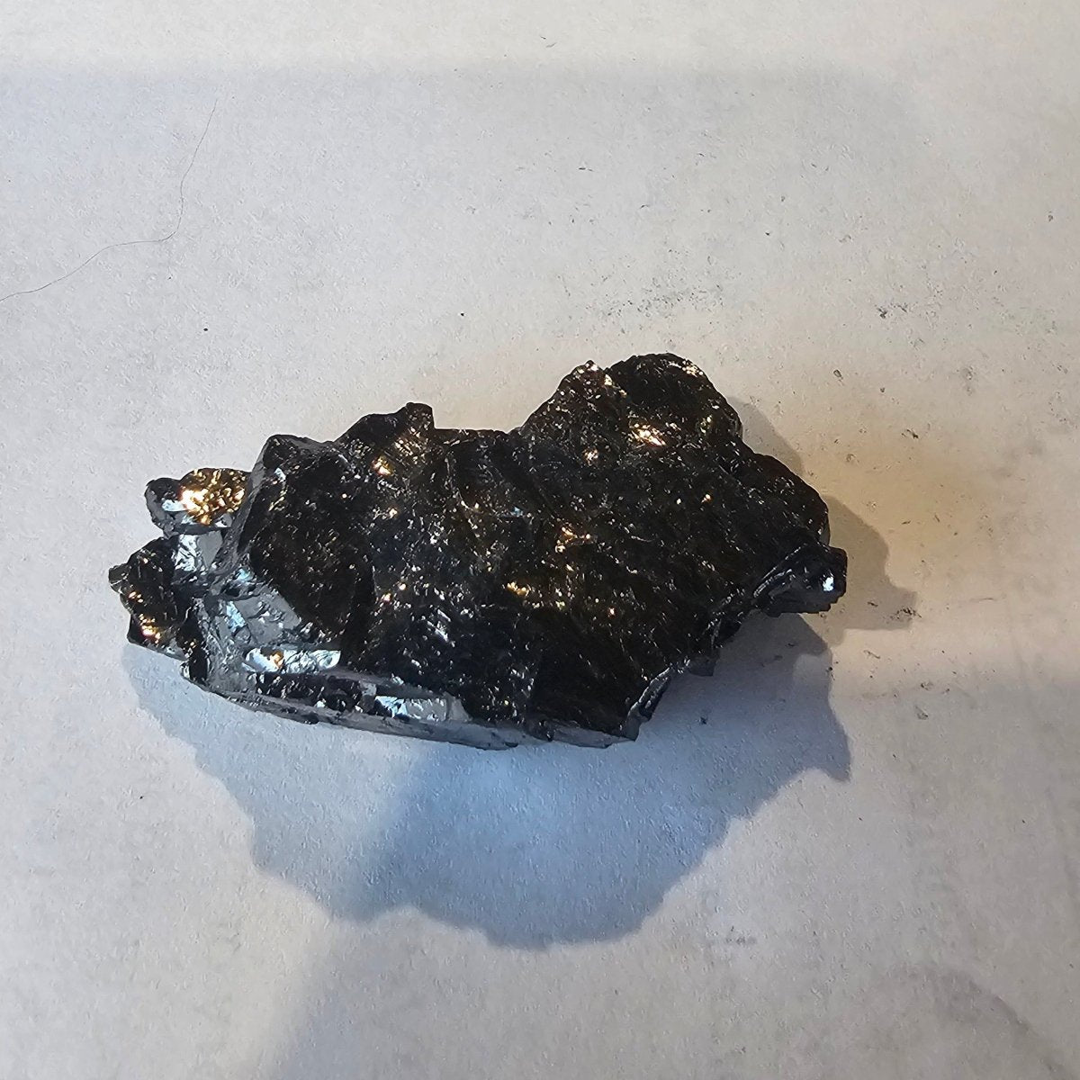 Shungite Crystal: Rare One-Piece Nugget - Tongariro (New Zealand) - GroundedKiwi.nz air travelcarchunk