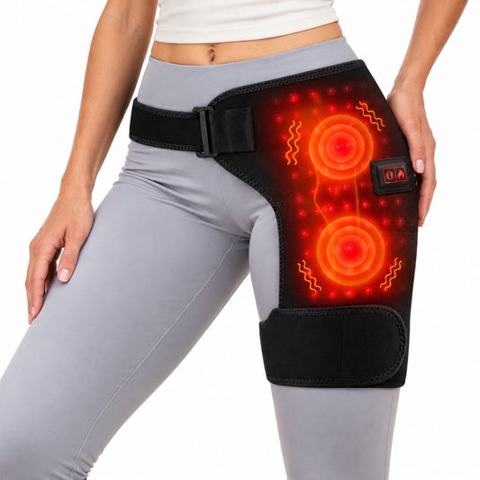 Woman in grey leggings wearing a red light therapy belt over her hip and thigh, LED pads glowing