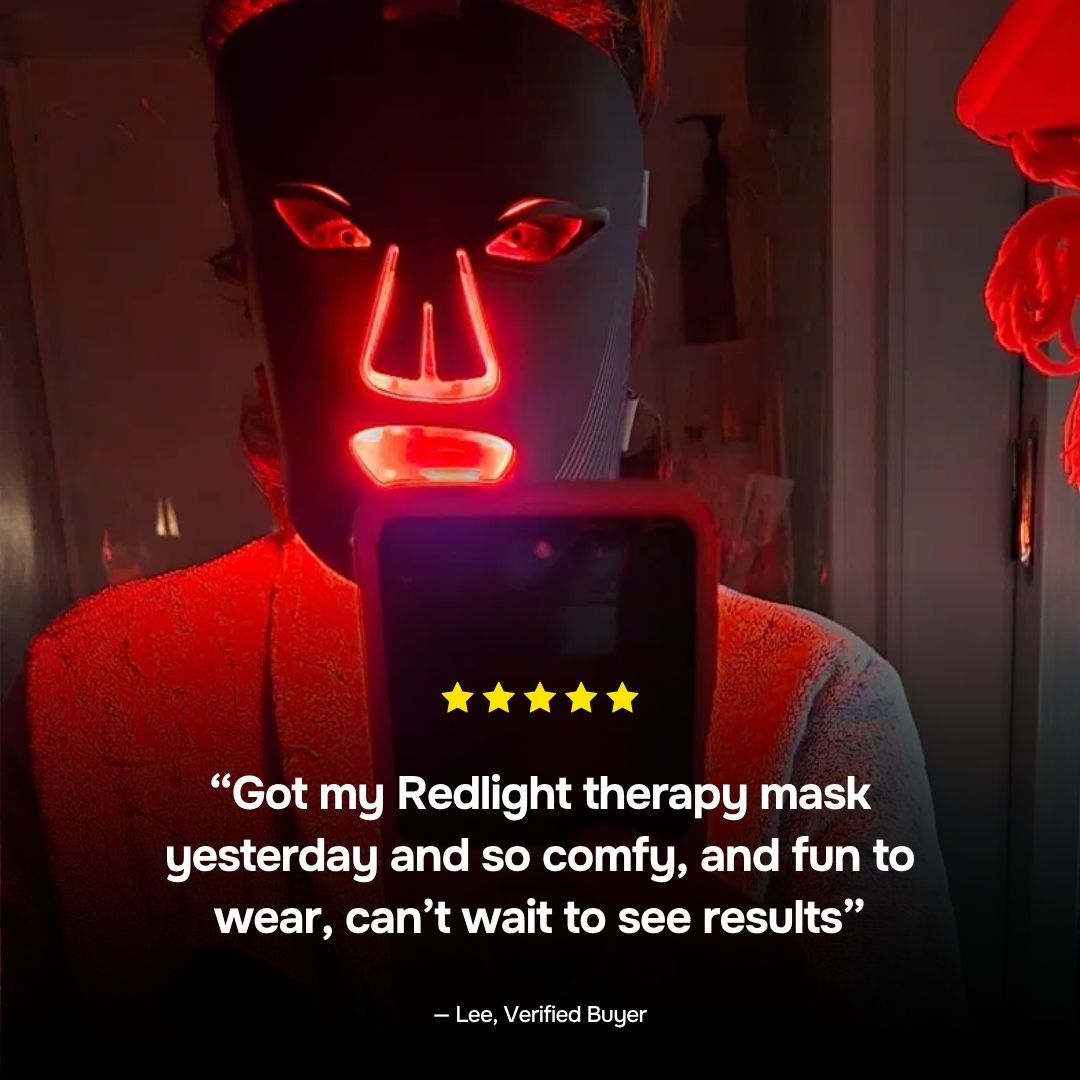Customer mirror selfie wearing a glowing red light face mask NZ with five-star review