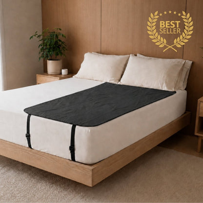 Grounded Kiwi grounding mat on bed, single size earthing mat with adjustable universal straps for flexible placement