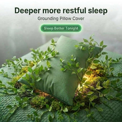 Green grounding pillow cover on a bed with plants and a serene background, promoting better sleep.