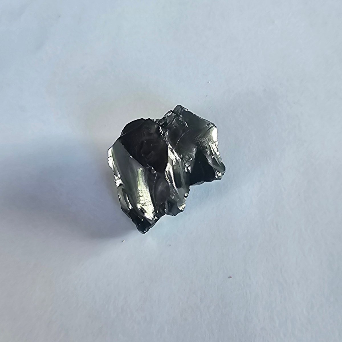 Mount Everest elite shungite nugget, 12.5g: compact nugget with mirror-like curved silvery facets