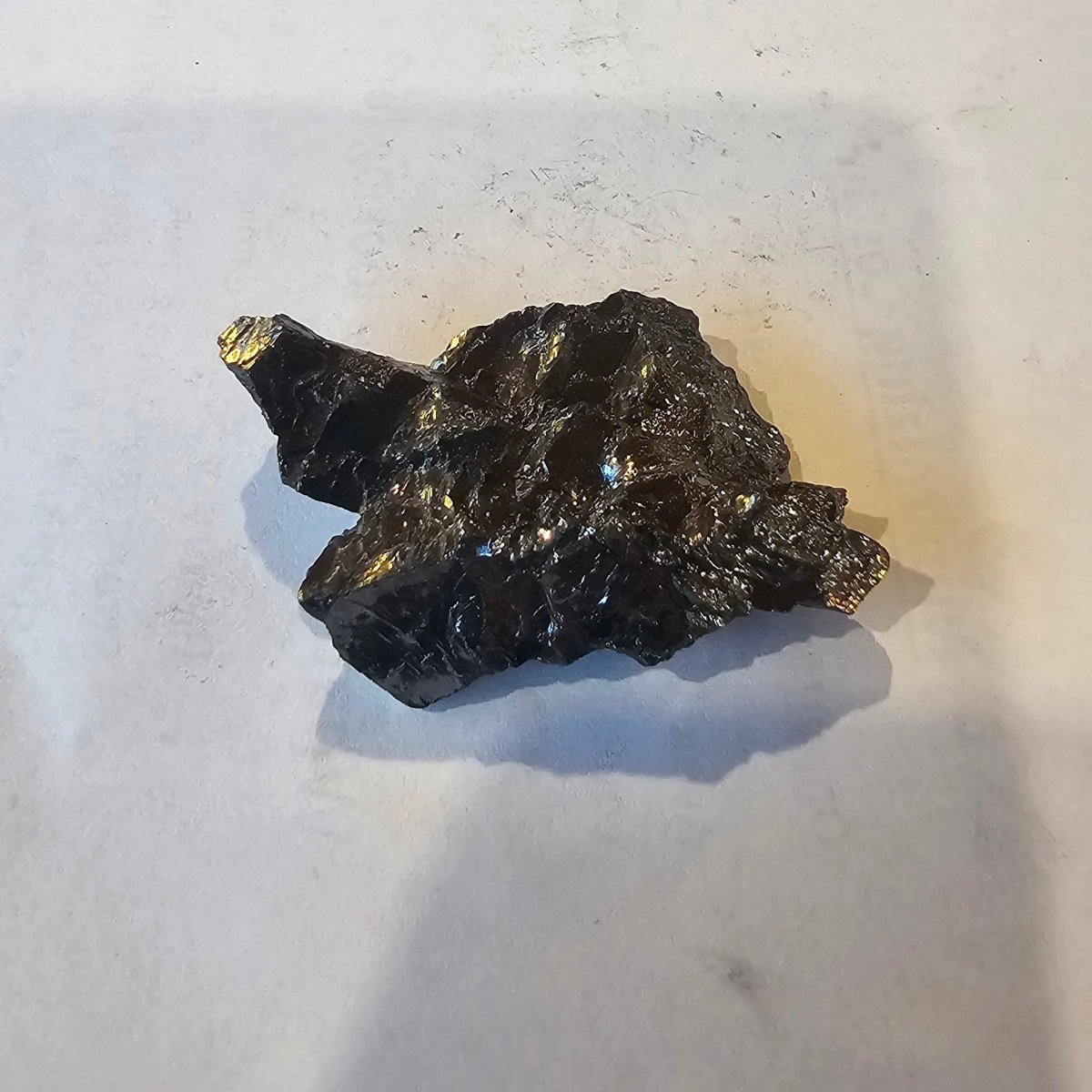 Shungite Crystal: Rare One-Piece Nugget - Abi Gamin (India) - GroundedKiwi.nz air travelcarchunk