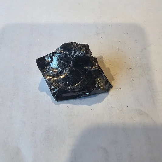 Shungite Crystal: Rare One-Piece Nugget - Broad Peak - GroundedKiwi.nz air travelcarchunk