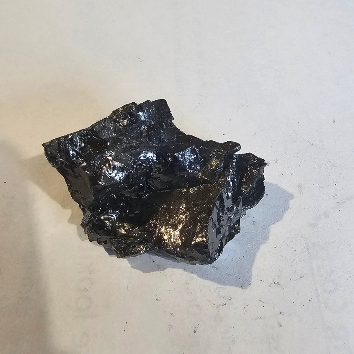 Shungite Crystal: Rare One-Piece Nugget - Dixon Peak - GroundedKiwi.nz air travelcarchunk