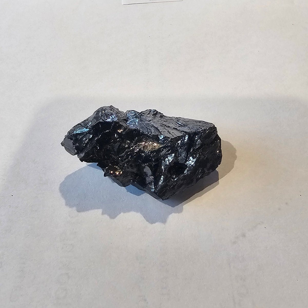 Shungite Crystal: Rare One-Piece Nugget - Douglas Peak - GroundedKiwi.nz air travelcarchunk