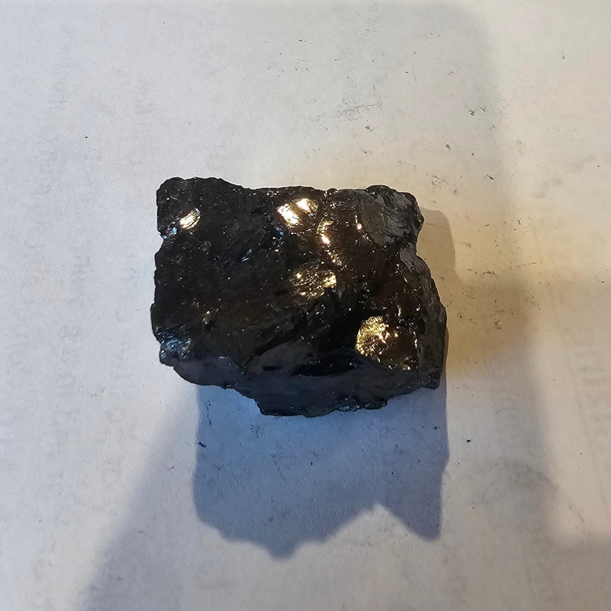 Shungite Crystal: Rare One-Piece Nugget - K2 - GroundedKiwi.nz air travelcarchunk