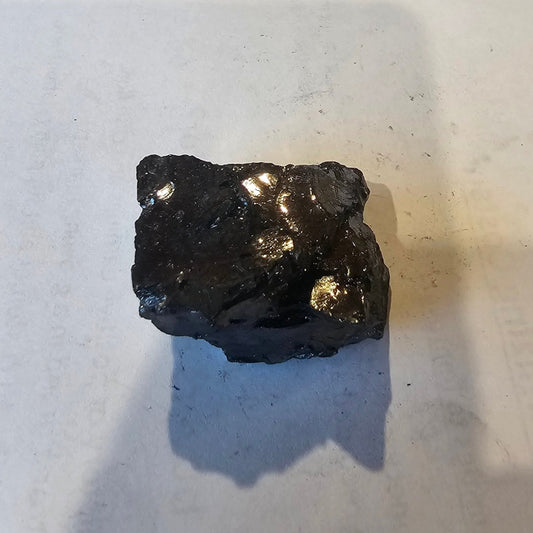 Shungite Crystal: Rare One-Piece Nugget - K2 - GroundedKiwi.nz air travelcarchunk
