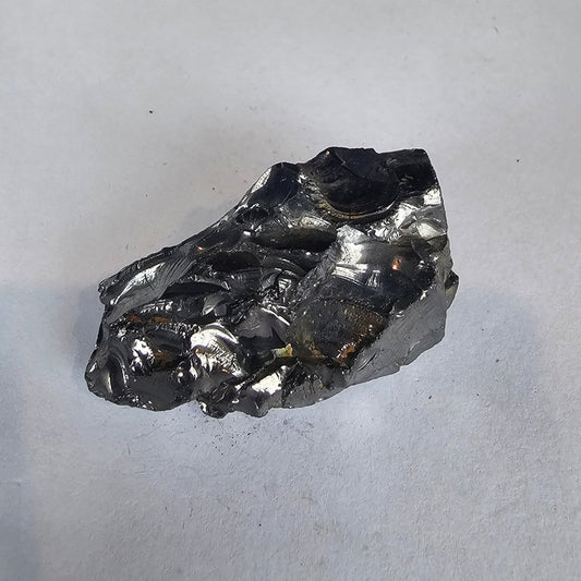 Shungite Crystal: Rare One - Piece Nugget - K4 (Pakistan & China) - GroundedKiwi.nz air travelcarchunk