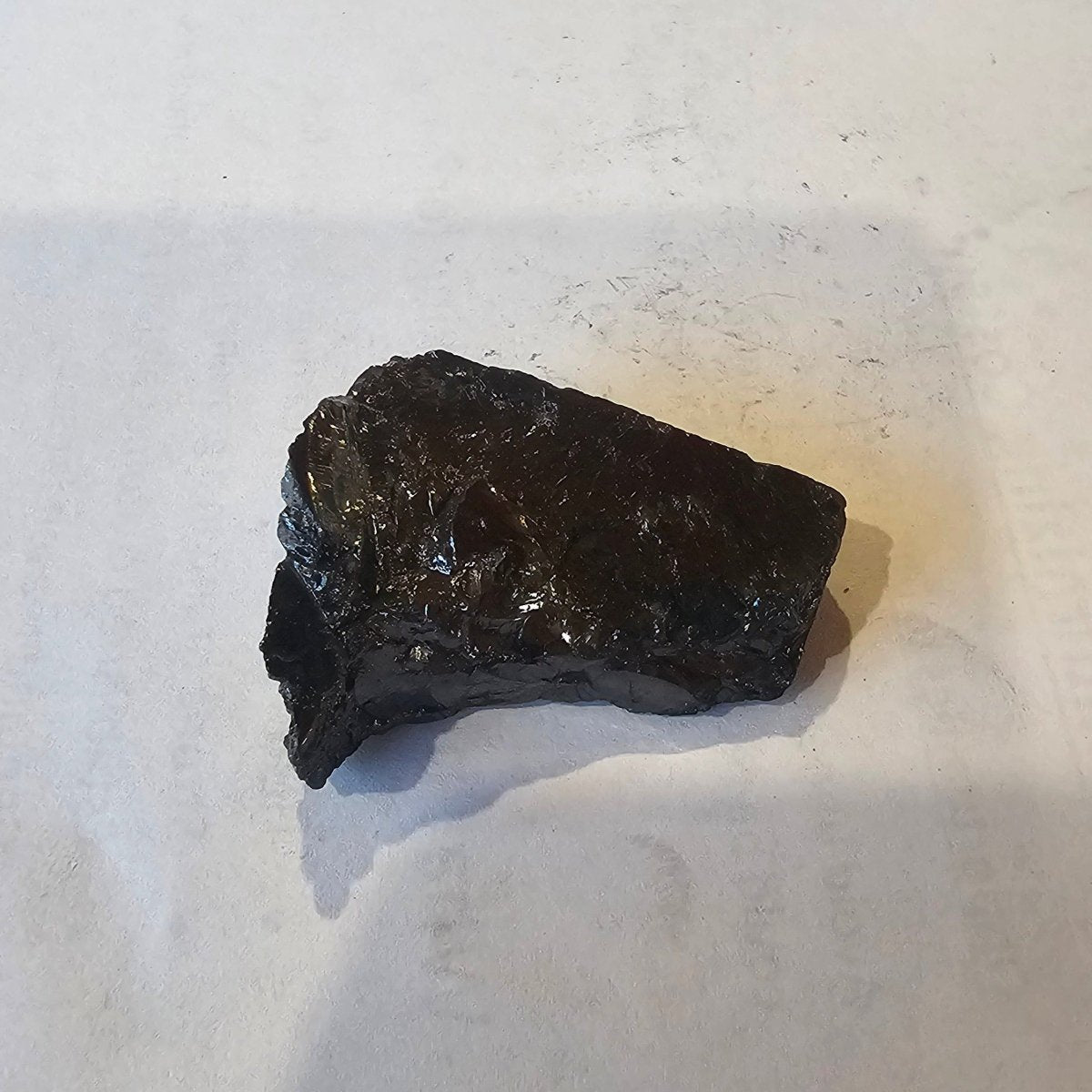 Shungite Crystal: Rare One-Piece Nugget - K4 (Pakistan & China) - GroundedKiwi.nz air travelcarchunk
