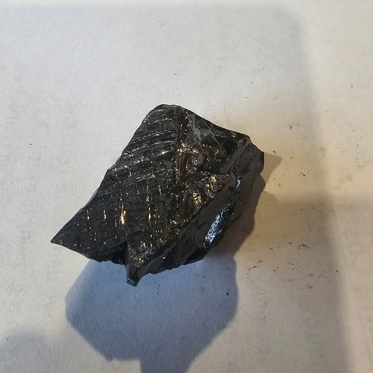 Shungite Crystal: Rare One-Piece Nugget - Maunga Roa (Cook Islands) - GroundedKiwi.nz air travelcarchunk