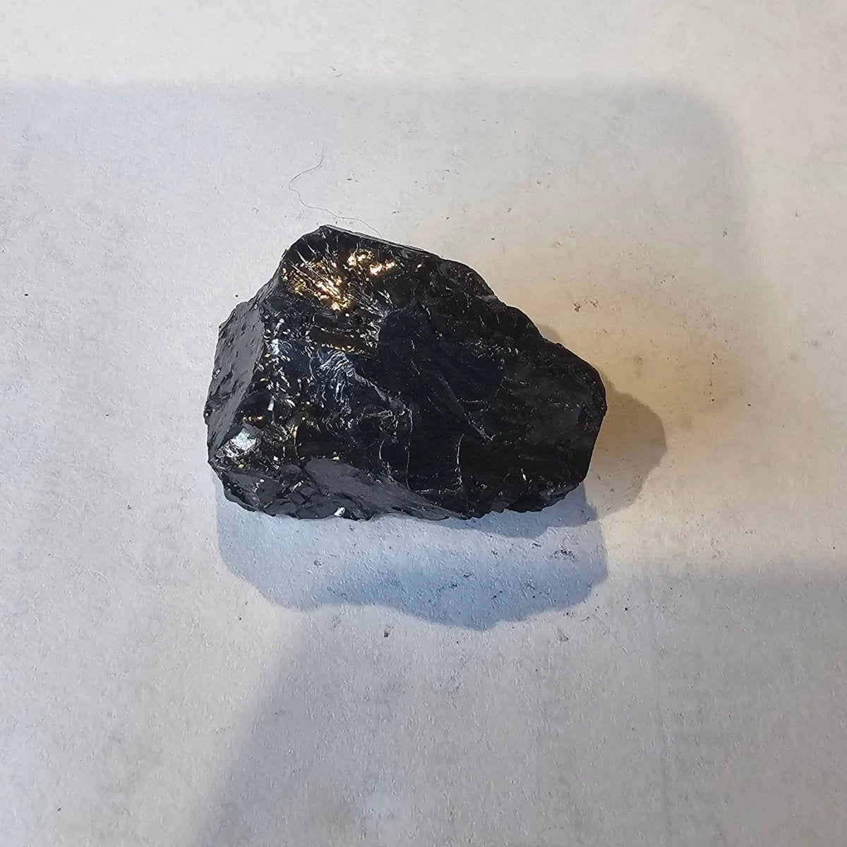 Shungite Crystal: Rare One-Piece Nugget - Maungatea (Cook Islands) - GroundedKiwi.nz air travelcarchunk