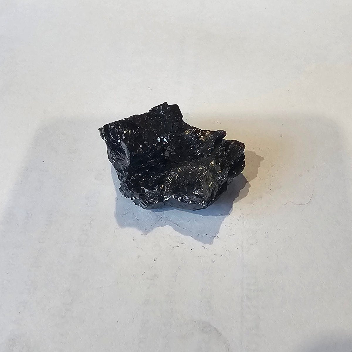 Shungite Crystal: Rare One-Piece Nugget - Mitre Peak - GroundedKiwi.nz air travelcarchunk