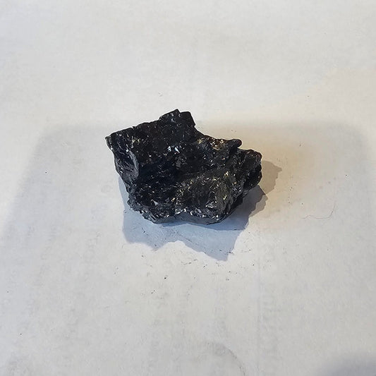 Shungite Crystal: Rare One-Piece Nugget - Mitre Peak - GroundedKiwi.nz air travelcarchunk