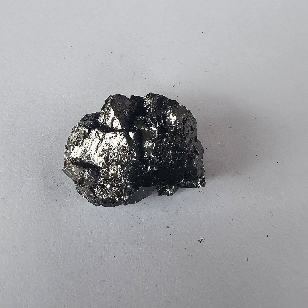 Shungite Crystal: Rare One - Piece Nugget - Mitre Peak - GroundedKiwi.nz air travelcarchunk