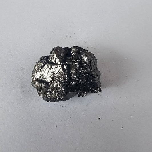 Shungite Crystal: Rare One - Piece Nugget - Mitre Peak - GroundedKiwi.nz air travelcarchunk