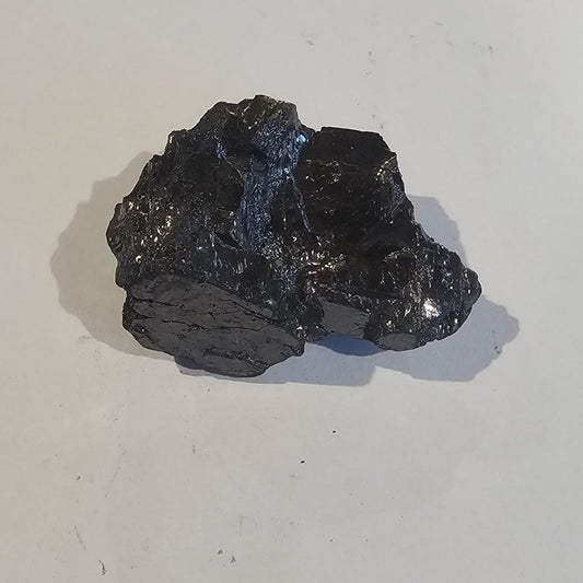Shungite Crystal: Rare One-Piece Nugget - Mont Blanc - GroundedKiwi.nz air travelcarchunk