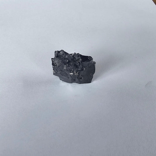Shungite Crystal: Rare One - Piece Nugget - Mount Cook - GroundedKiwi.nz air travelcarchunk
