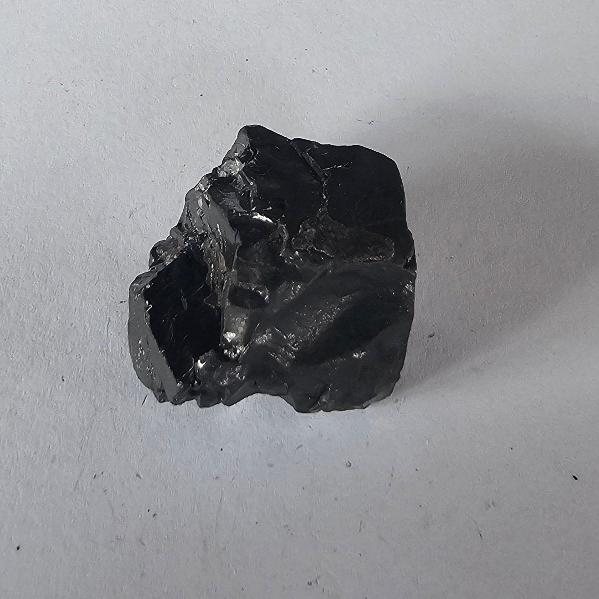 Shungite Crystal: Rare One - Piece Nugget - Mount Dampier (New Zealand) - GroundedKiwi.nz air travelcarchunk