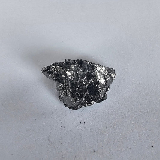 Shungite Crystal: Rare One - Piece Nugget - Mount Gangapurna (Nepal) - GroundedKiwi.nz air travelcarchunk