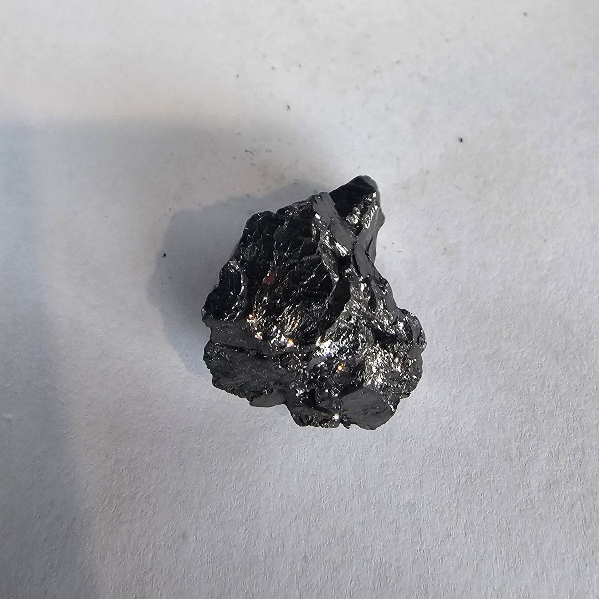 Shungite Crystal: Rare One - Piece Nugget - Mount Himalchuli (Nepal) - GroundedKiwi.nz air travelcarchunk