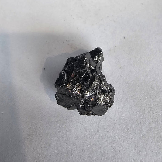 Shungite Crystal: Rare One - Piece Nugget - Mount Himalchuli (Nepal) - GroundedKiwi.nz air travelcarchunk