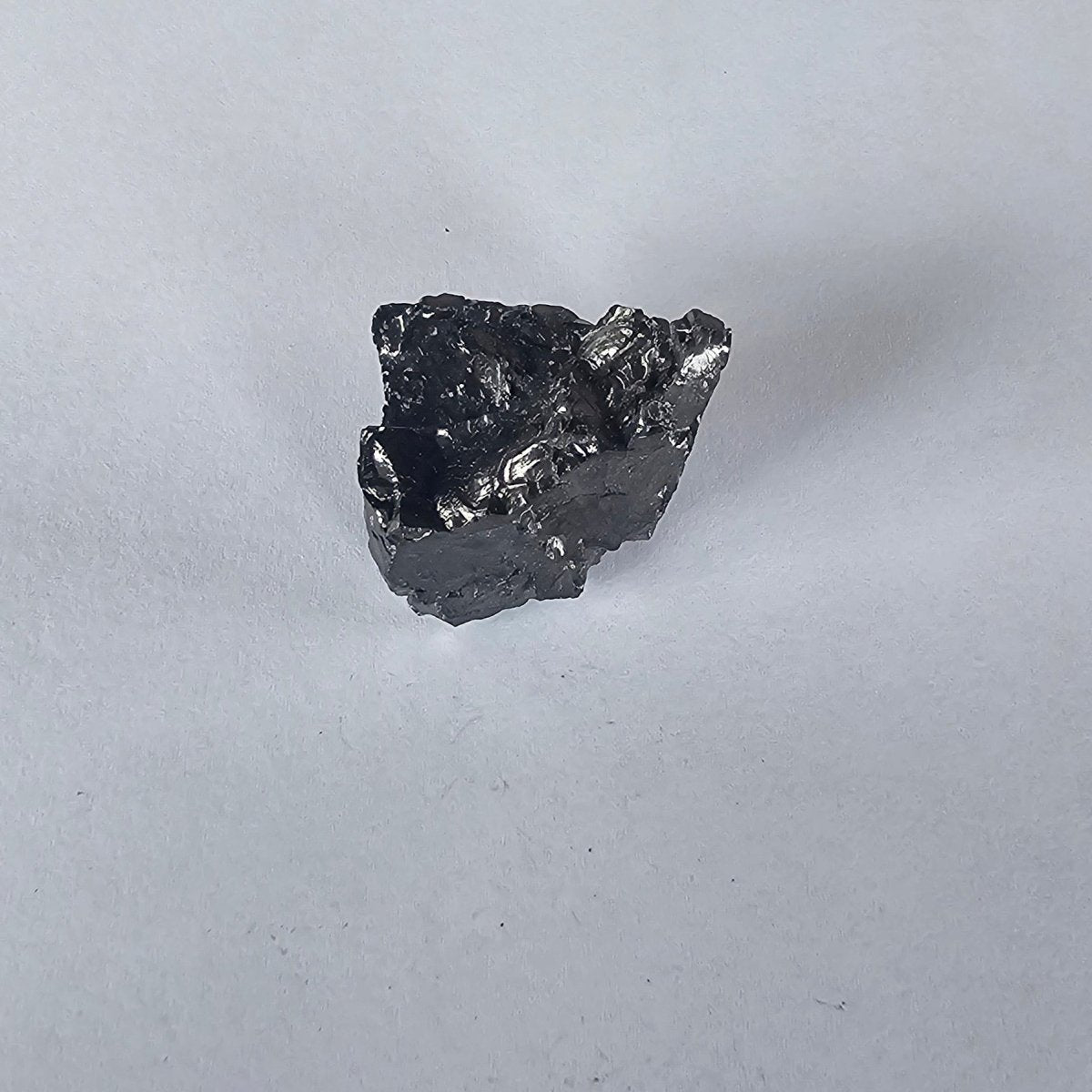 Shungite Crystal: Rare One - Piece Nugget - Mount Himalchuli (Nepal) - GroundedKiwi.nz air travelcarchunk