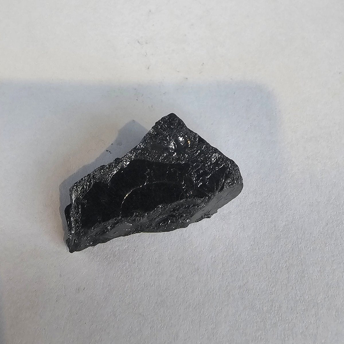 Shungite Crystal: Rare One - Piece Nugget - Mount Logan - GroundedKiwi.nz air travelcarchunk