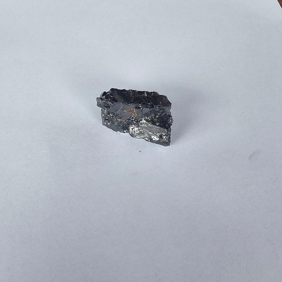 Shungite Crystal: Rare One - Piece Nugget - Mount Logan - GroundedKiwi.nz air travelcarchunk