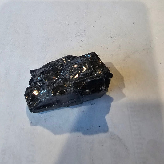 Shungite Crystal: Rare One-Piece Nugget - Mount Noshaq (Afghanistan) - GroundedKiwi.nz air travelcarchunk
