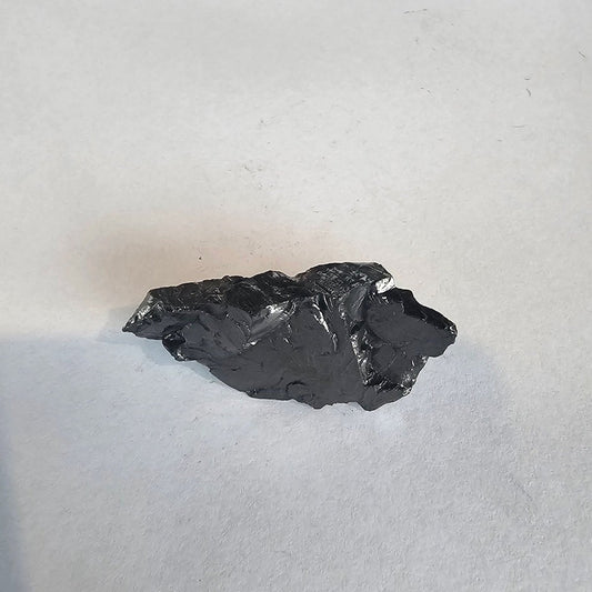 Shungite Crystal: Rare One - Piece Nugget - Mount Rainier - GroundedKiwi.nz air travelcarchunk