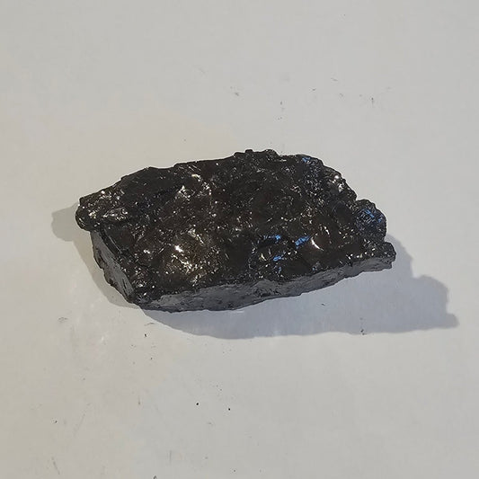 Shungite Crystal: Rare One-Piece Nugget - Mount Rainier - GroundedKiwi.nz air travelcarchunk
