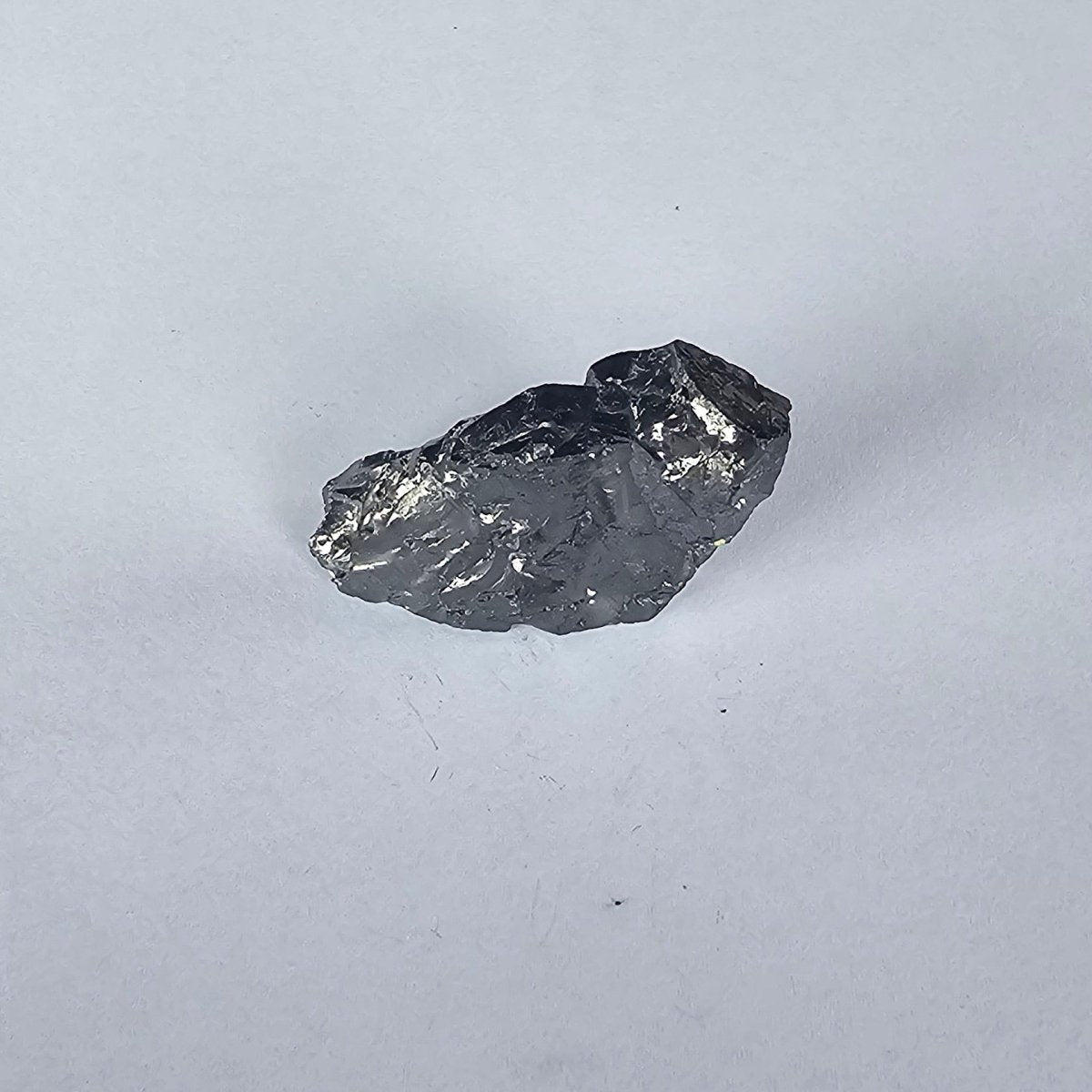 Shungite Crystal: Rare One - Piece Nugget - Mount Shasta - GroundedKiwi.nz air travelcarchunk