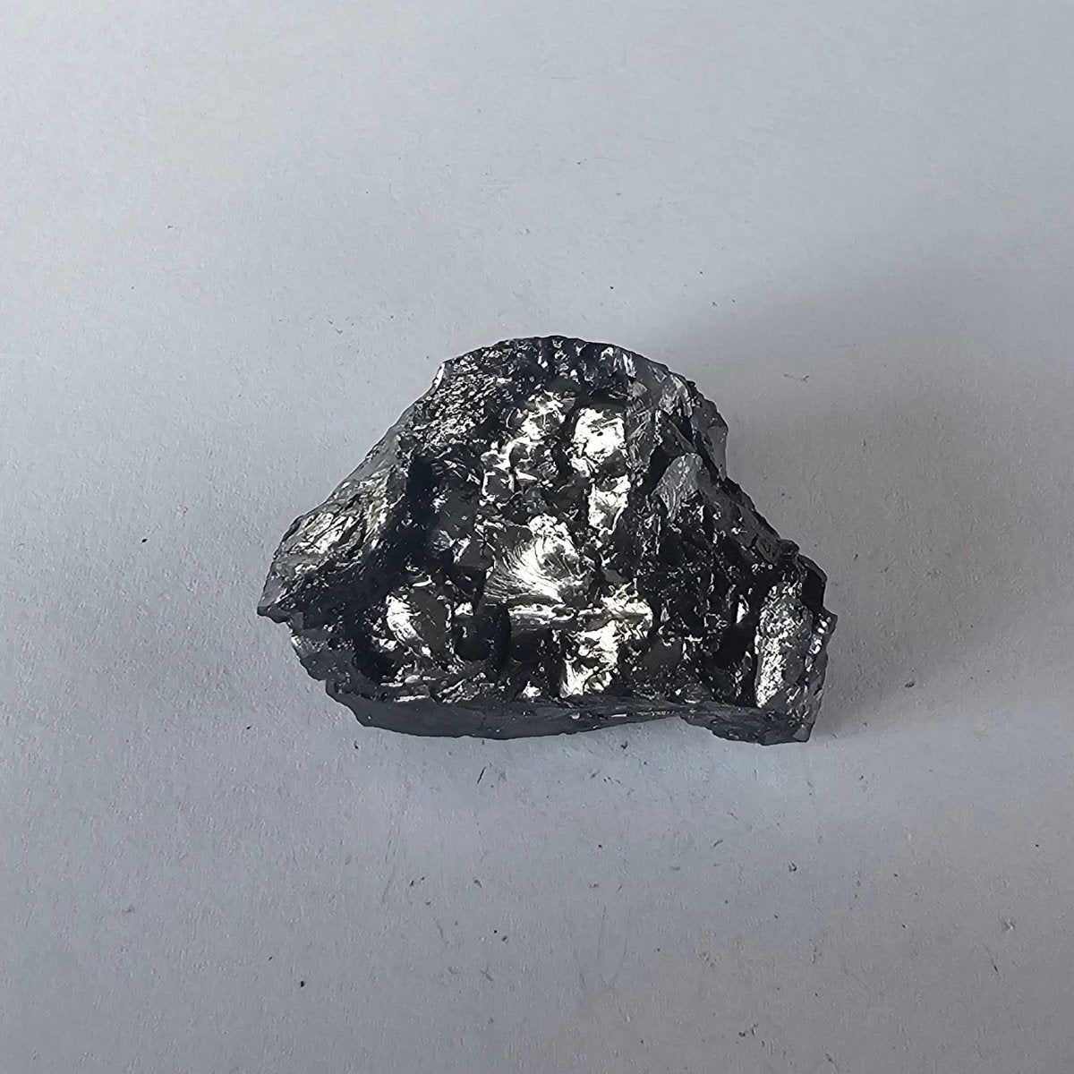 Shungite Crystal: Rare One - Piece Nugget - Mount Tasman (New Zealand - GroundedKiwi.nz air travelcarchunk