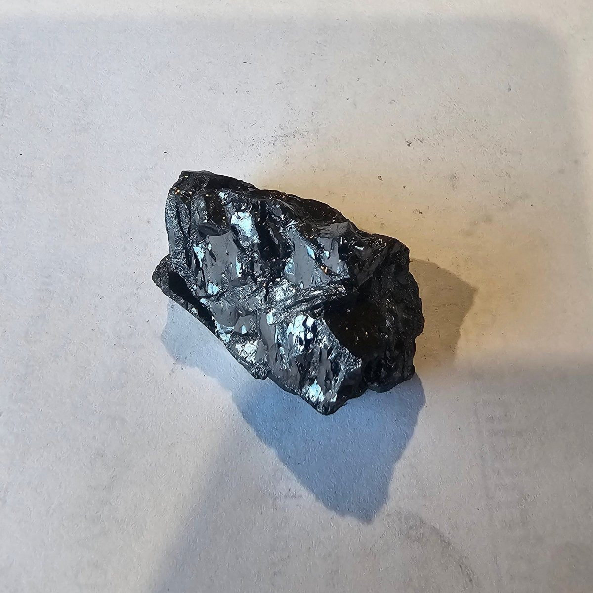 Shungite Crystal: Rare One-Piece Nugget - Ruapehu - GroundedKiwi.nz air travelcarchunk