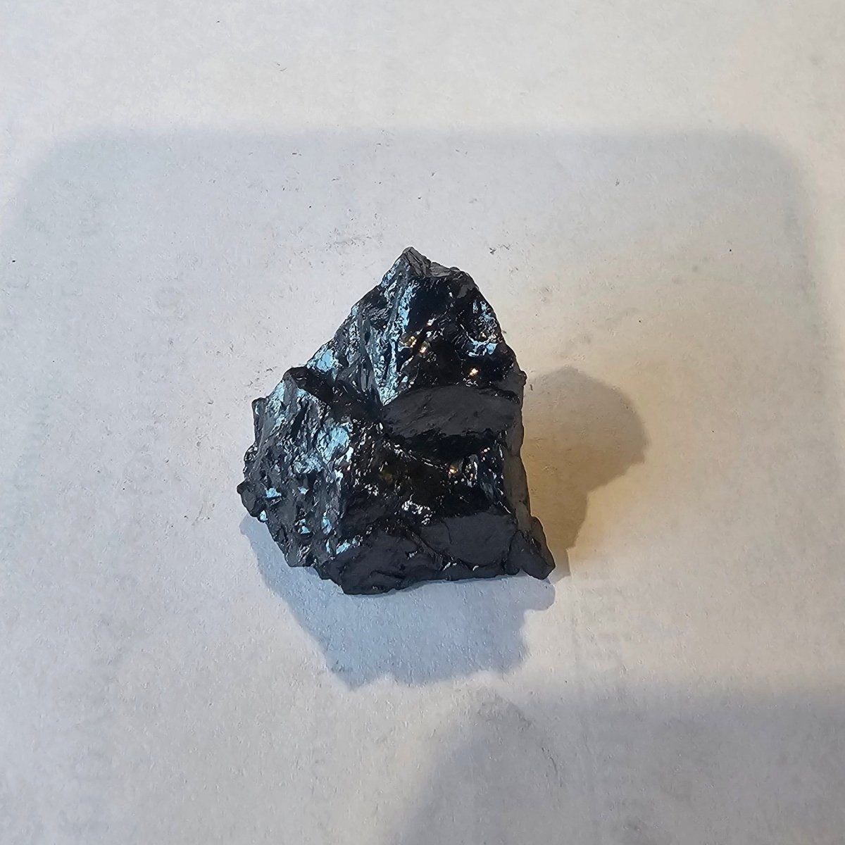 Shungite Crystal: Rare One-Piece Nugget - Silberhorn (New Zealand) - GroundedKiwi.nz air travelcarchunk