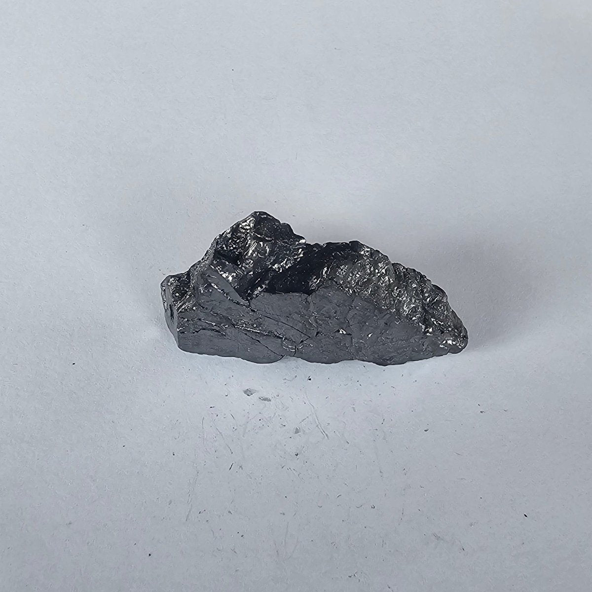 Shungite Crystal: Rare One - Piece Nugget - Silberhorn (New Zealand) - GroundedKiwi.nz air travelcarchunk