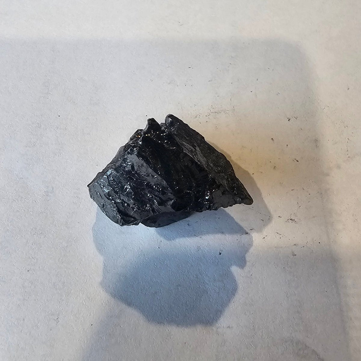 Shungite Crystal: Rare One-Piece Nugget - Te Manga (Cook Islands) - GroundedKiwi.nz air travelcarchunk