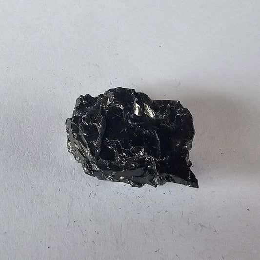 Shungite Crystal: Rare One - Piece Nugget - Tongariro (New Zealand) - GroundedKiwi.nz air travelcarchunk