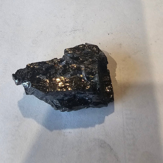 Shungite Crystal: Rare One-Piece Nugget - Whakaari (New Zealand) - GroundedKiwi.nz air travelcarchunk