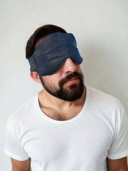 Shungite eyemask. Picture of man wearing the eye mask - Shungite rocks