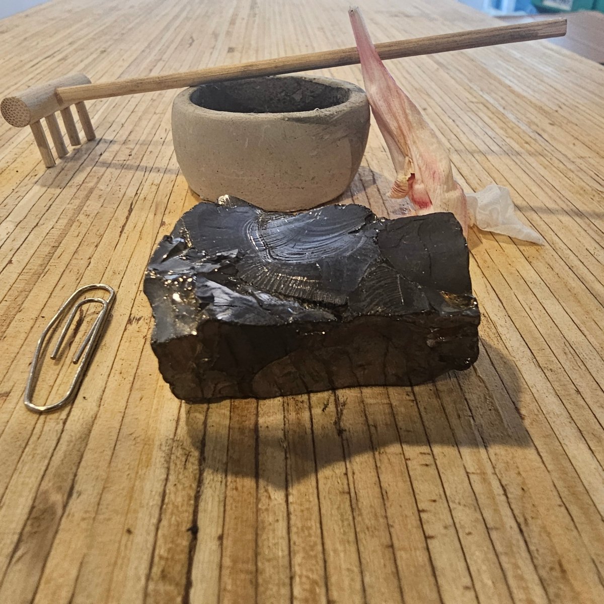 The Ultimate Shungite: Rare One - Piece Nugget - Mount Hicks - GroundedKiwi.nz air travelcarchunk